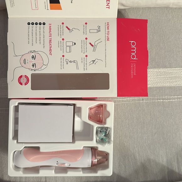NWT..PMD Microdermabrasion Tool..
Condition: Never used, no box. Color: Pink. - Picture 3 of 6